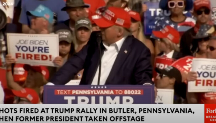 Shots Fired At Trump Rally, Former President Pumps Fist As He's Rushed Off Stage