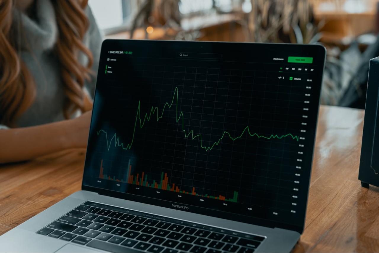 Screen of laptop showing charts